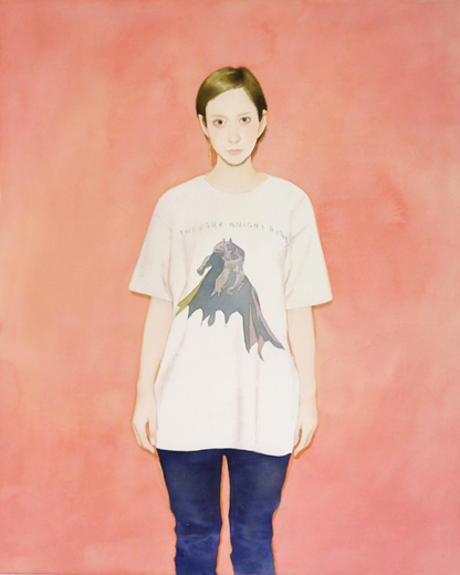 in front of a red wall