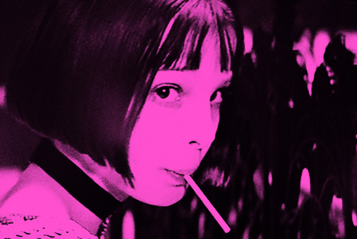 The girl who eats a candy:pink(from movie "Leon")