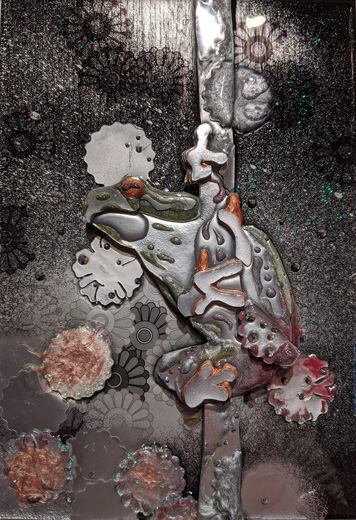 Metal frog in the flower
