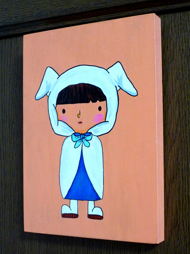 白マントの少女